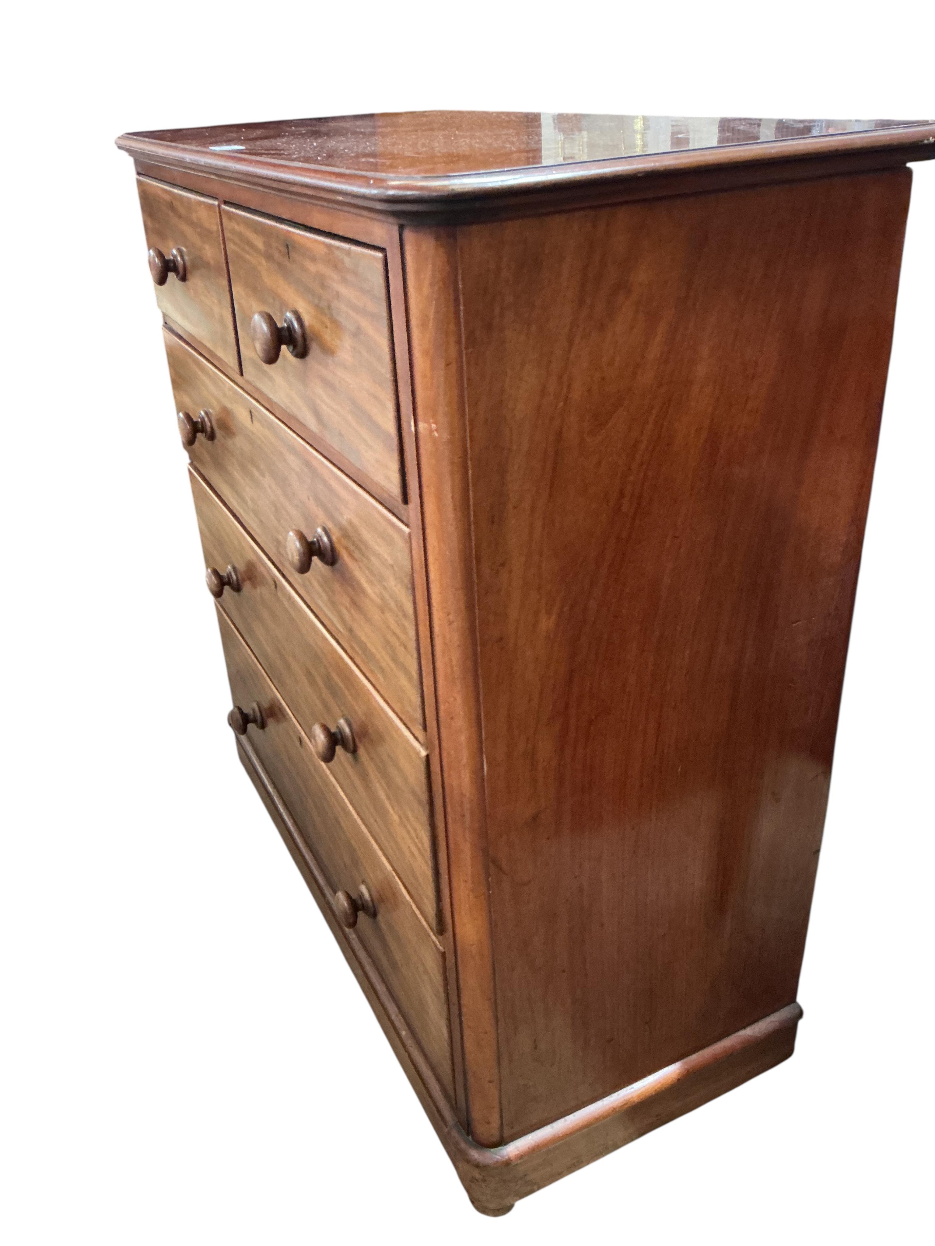 A Victorian mahogany chest, fitted two short and three long drawers, width 118cm, depth 51cm, height 118cm